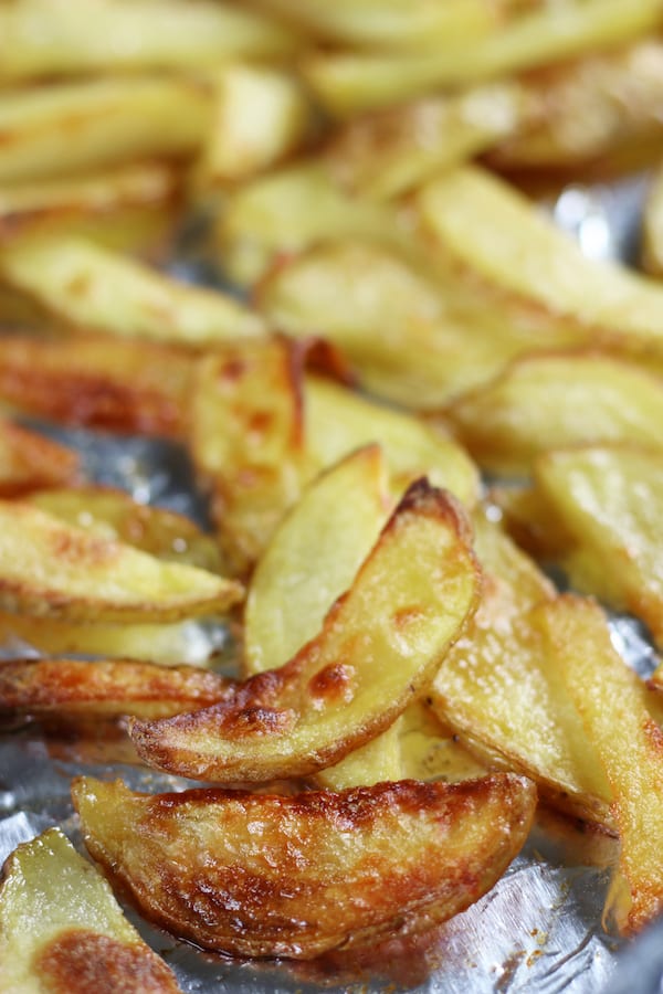 Crispy Baked French Fries on a cookie sheet.