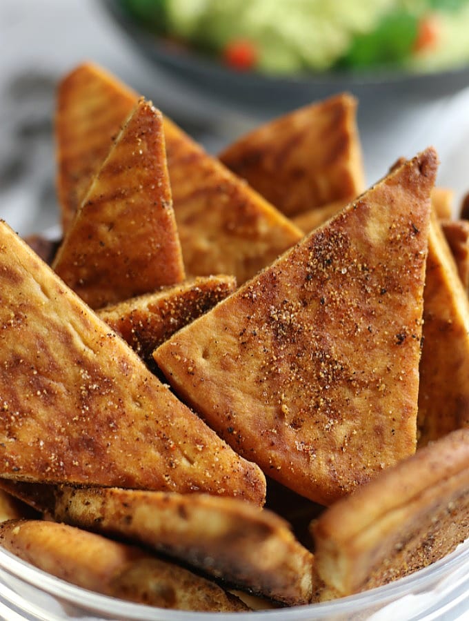 Baked Pita Chips sitting in a bowl.