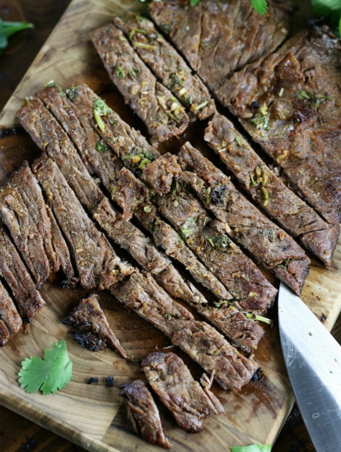 Marinated, grilled and cut flap steak from Carne Asada Recipe.