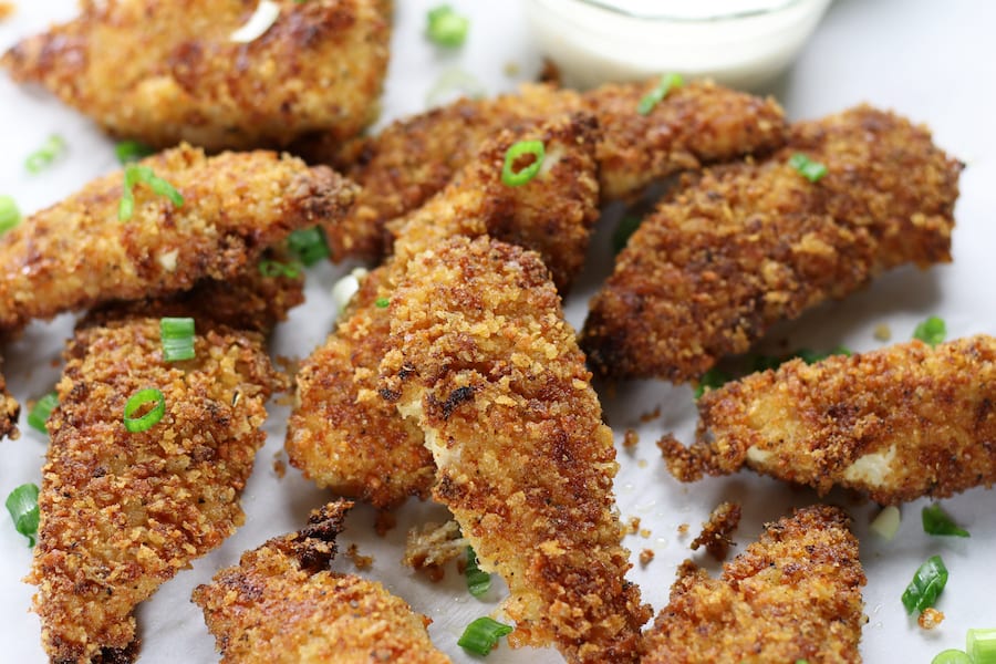 Fried Panko Chicken Strips with a side of ranch dressing.
