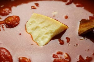 Parmesan Rind In The Cooking of Tomaot Basil Soup