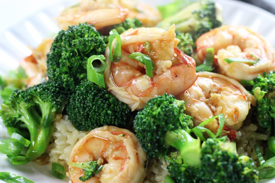 Up close photo of Shrimp Broccoli Stir Fry with green onions.