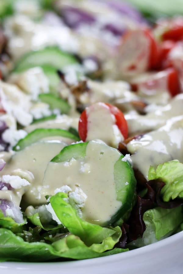 Creamy Lemon Dressing on top of a salad.