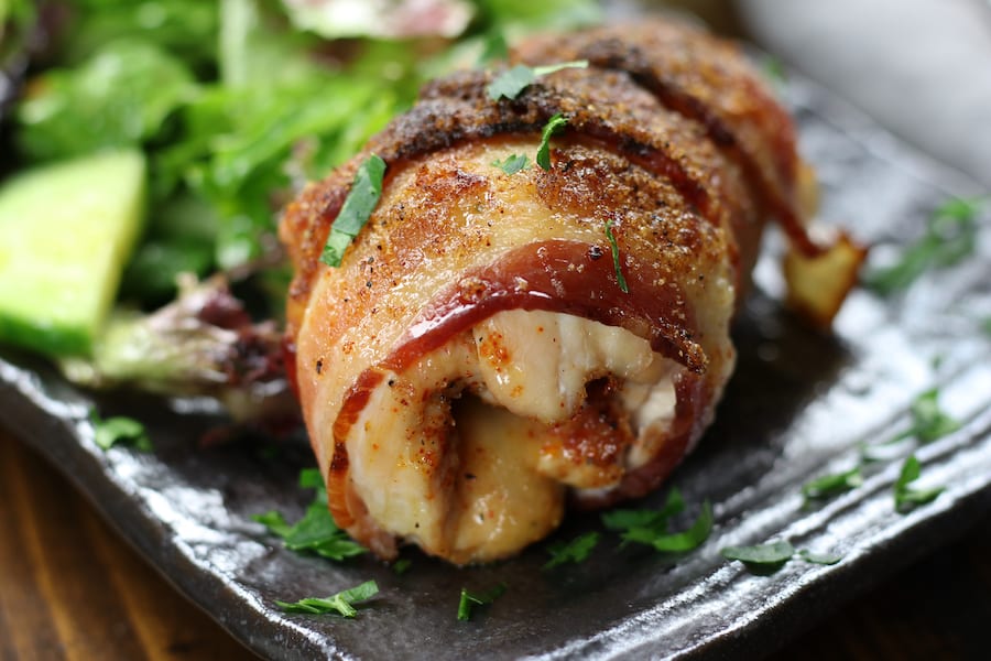 Up close photo of Bacon Wrapped Stuffed Chicken Breast.