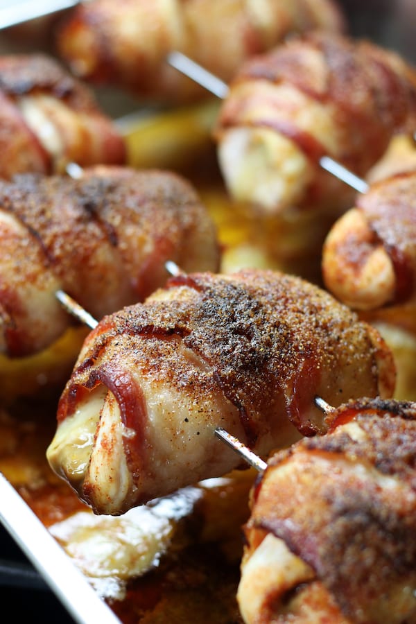 Baked Stuffed Chicken Breast with bacon on BBQ skewers.