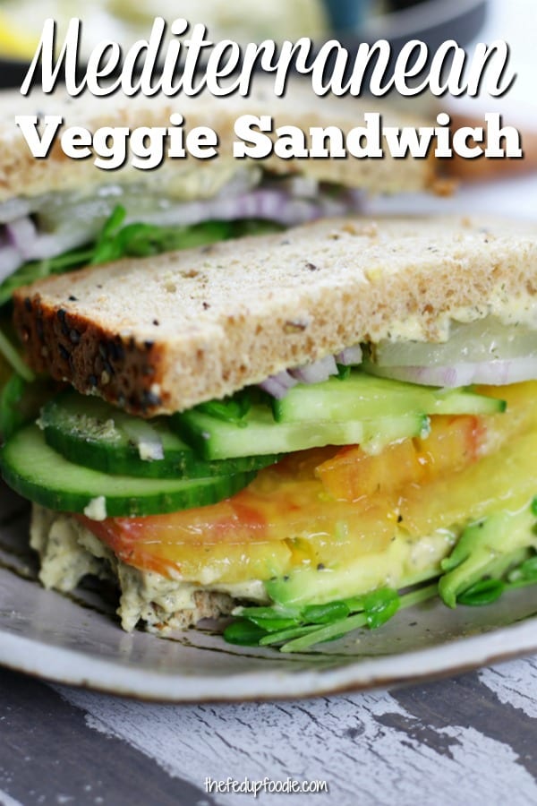 This Mediterranean Veggie Sandwich is not only healthy , it is extremely tempting. Fluffy whole grain bread, zesty lemon hummus and crisp veggies all come together for an easy and delicious lunch. 
#VeggieSandwich #LunchIdeas #HealthySandwich #EasySandwich #Mediterranean https://www.thefedupfoodie.com