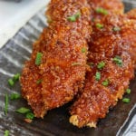 Chinese Chicken Fingers on a grey plate.