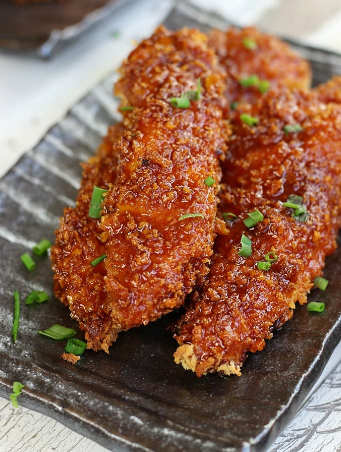 Chinese Chicken Fingers on a grey plate.