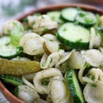 Dill Pickle Pasta Saladin a brown wooden bowl.