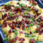 Loaded Mashed Potatoes in a blue baking dish.