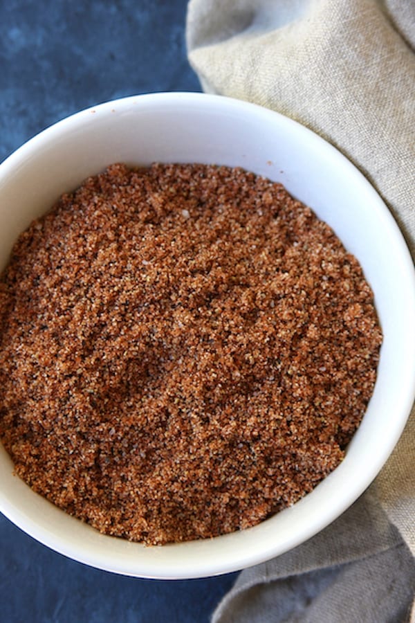 Ultimate Dry Rub for Ribs, Chicken, Wings and Beef in a white bowl.