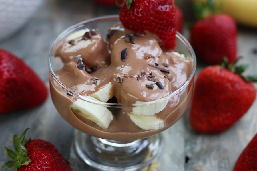 A Yogurt Parfait with fruit, yogurt fruit dip and cacao nibs.