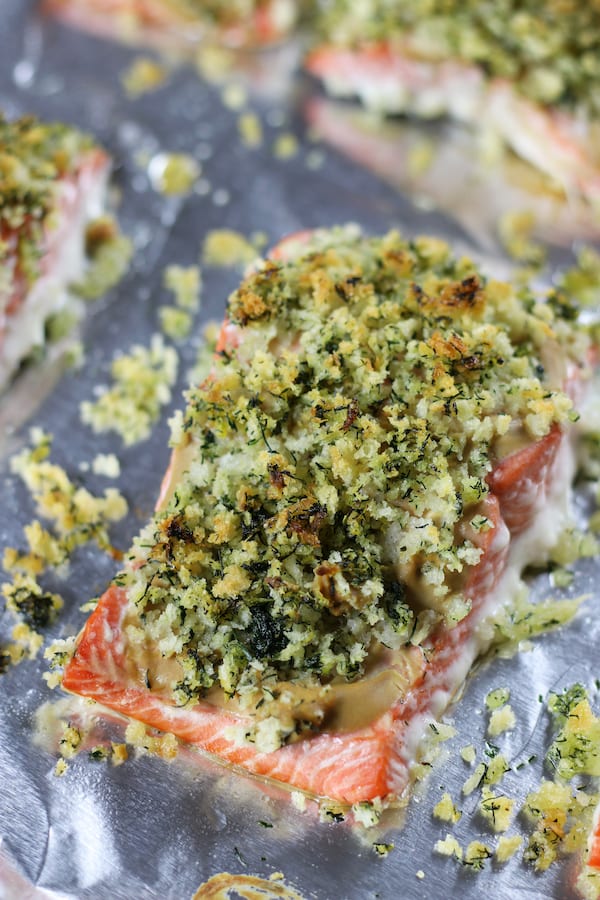 Several pieces of salmon on a cookie sheet from Baked Salmon Recipe.