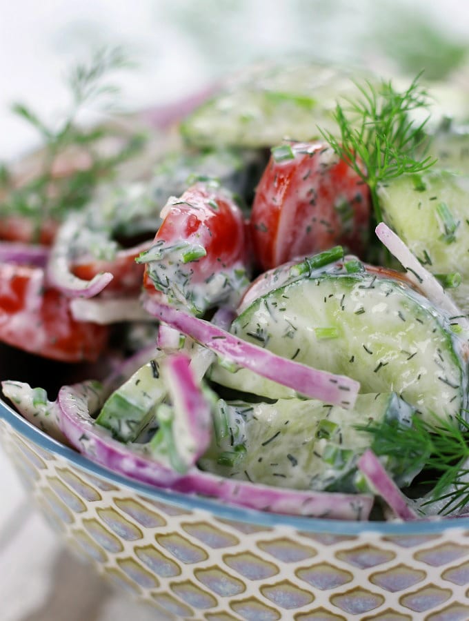 Up close photo Creamy Cucumber Tomato Salad.
