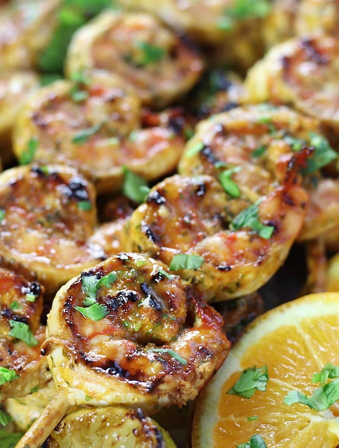 Mango Shrimp Kabobs garnished with cilantro.