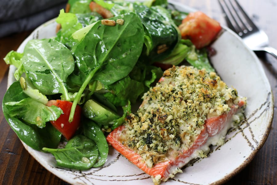 Panko Salmon on a grey striped plate with a salad.