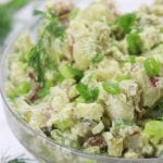 Red Potato Salad garnished with Green onions and fresh dill.