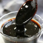 Balsamic Glaze coating a spoon that was dipped into it.