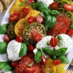 Overhead photo of a Burrata Caprese platter.