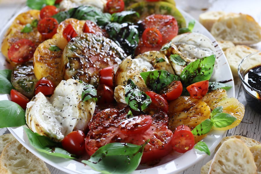 Burrata Caprese with Balsamic Glaze drizzled over the top.