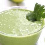 Cilantro Lime Sauce garnished with a large cilantro leaf.