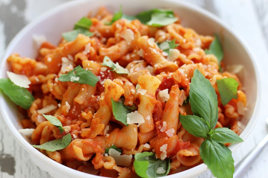 Overhead photo of Easy Vodka Sauce in a white bowl with noodles.