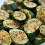 Roasted Zucchini Slices on a white platter.
