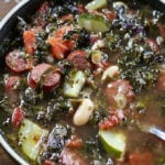 Overhead picture of Tuscan Kale Soup with a spoon.