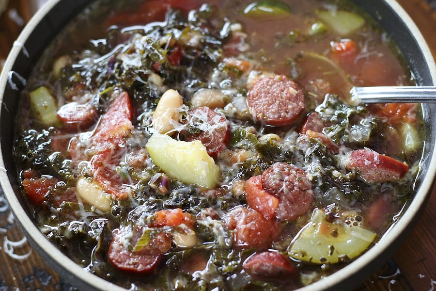 White Bean and Kale Soup with grated Parmesan.