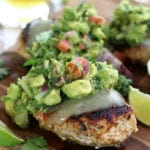 Easy Seared Chicken Guacamole resting on a cutting board.