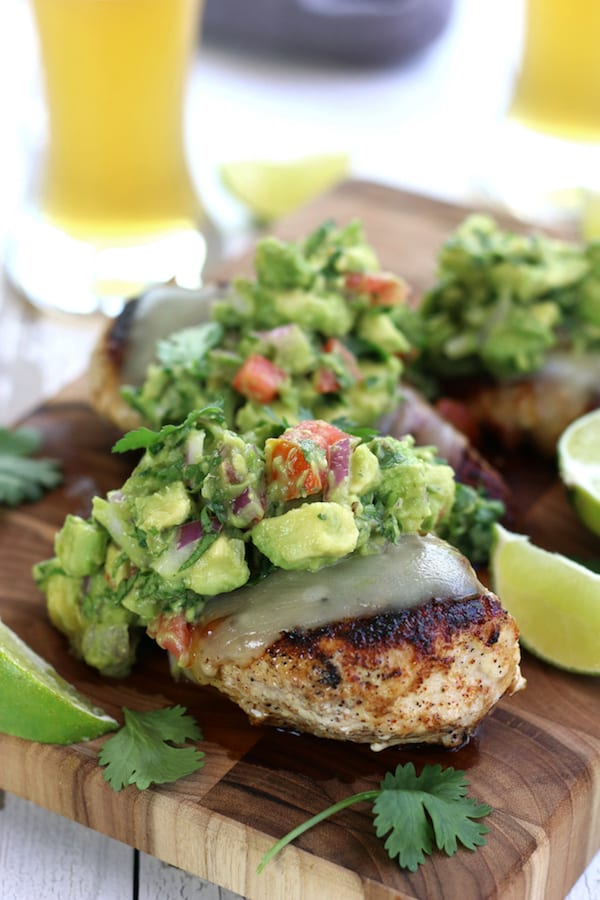 Three Pan Seared Chicken breast topped with Simple Healthy Guacamole.