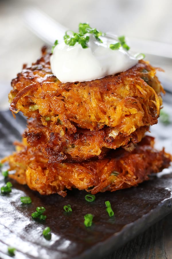 Sweet Potato Patties topped with sour cream and chives.