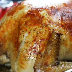 Up close photo of a golden turkey after brined in a Turkey Brine.
