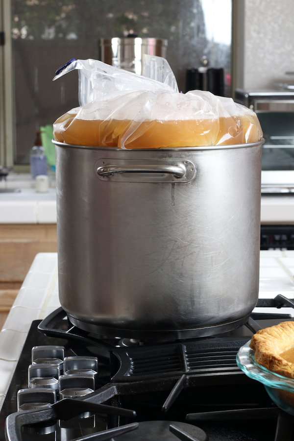 Large turkey being brined in a Turkey Brine Bag.