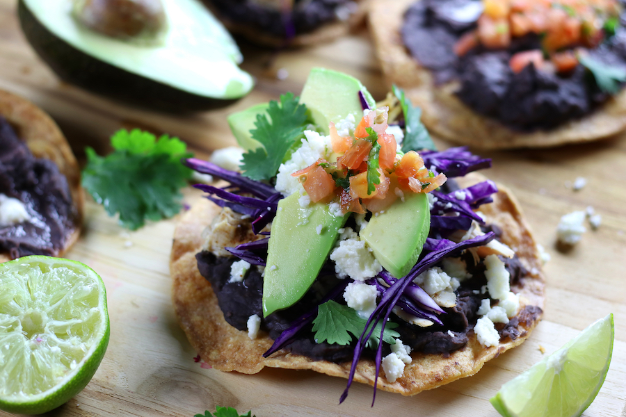 Side view of fully dressed Chicken Tostadas.