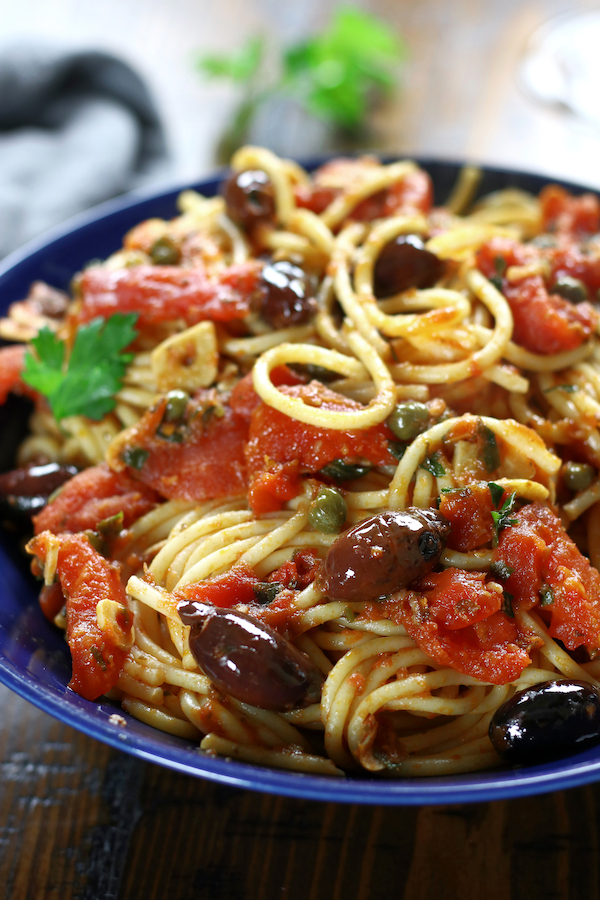 Pasta alla Puttanesca with spaghetti noodles.