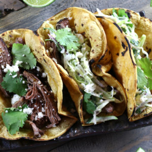 Overhead photo of Pulled Beef Tacos with Slaw.