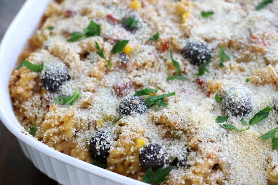 Up close photo of Salmon Casserole in a white French casserole dish.