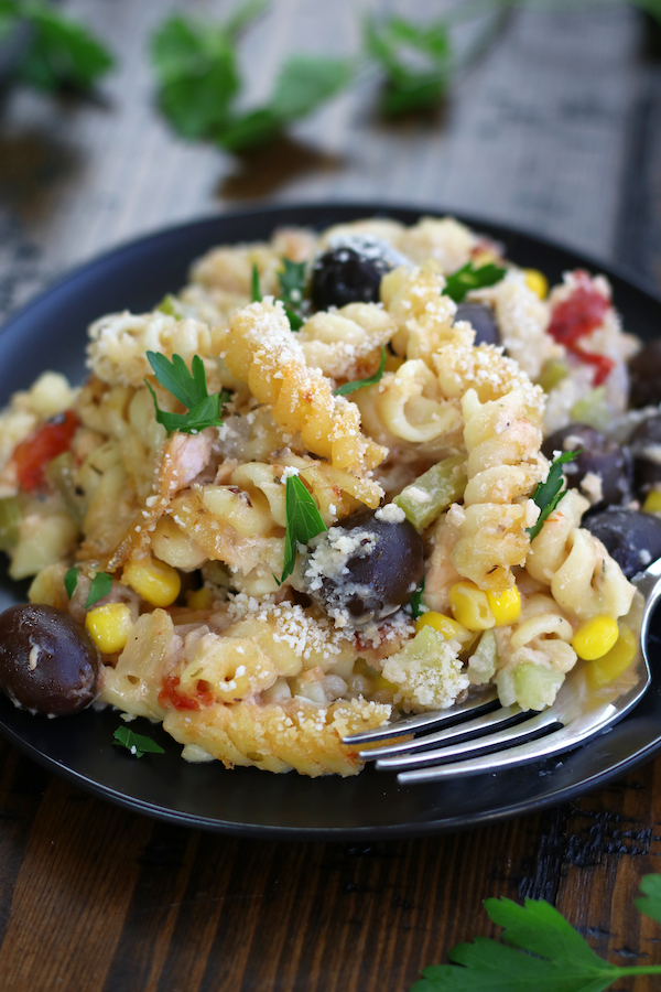 A serving of Salmon Pasta Bake garnished with parsley.