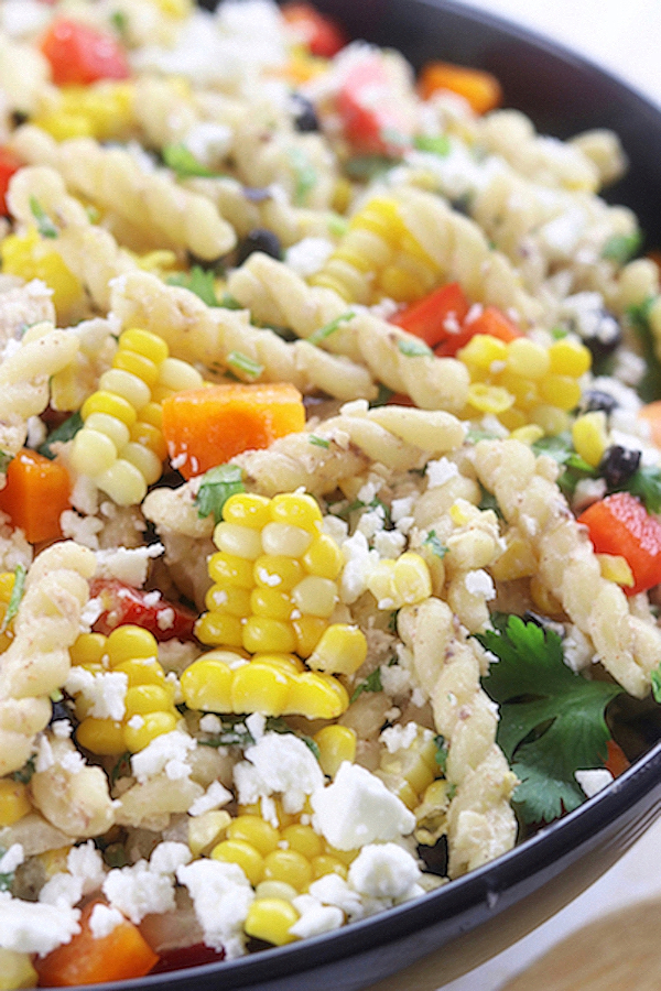 A large serving bowl of Southwest Pasta Salad.