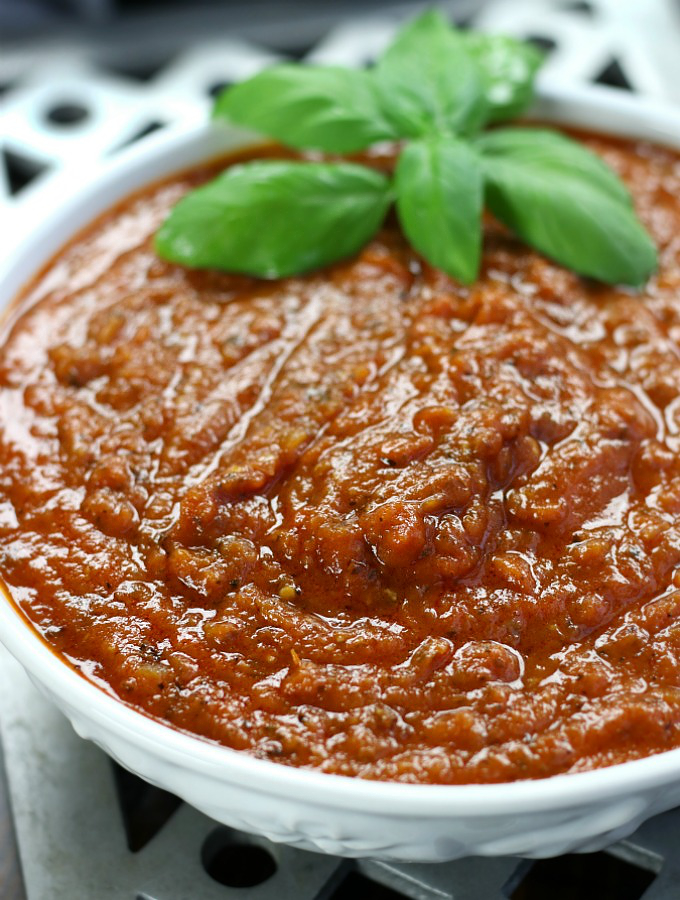 Napolitana Sauce garnished with fresh basil.