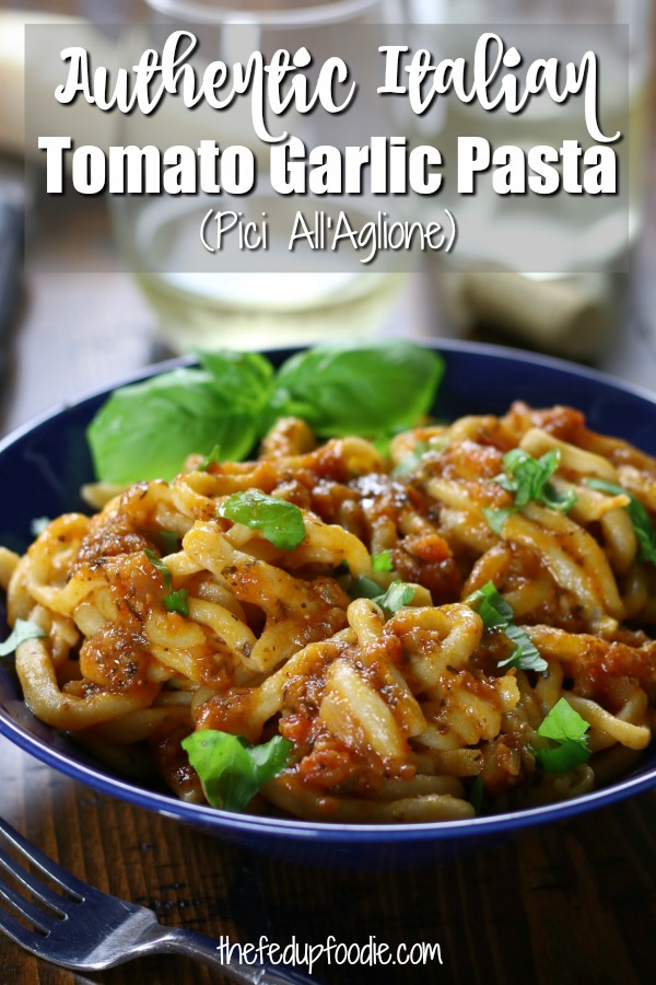 Pici All'Aglione (Tuscan Pasta with Tomato-Garlic Sauce) has thick and hearty homemade noodles with a rich and savory tomato sauce. This really is the perfect recipe to get the whole family involved for Sunday dinner. #HomemadePasta #TomatoGarlicPasta #PastaRecipes https://www.thefedupfoodie.com