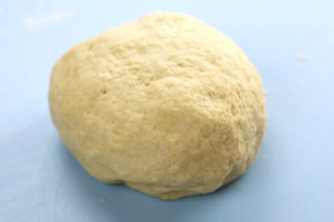 Smooth Pici Dough rolled into a ball Before Resting.