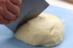 Cutting Flour Tortilla Dough In Half