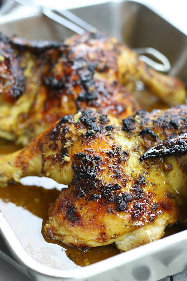 Juicy roasted chicken in a baking pan from Marinated Chicken Recipe.