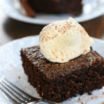 A slice of Broonie sitting on a white plate with a fork.