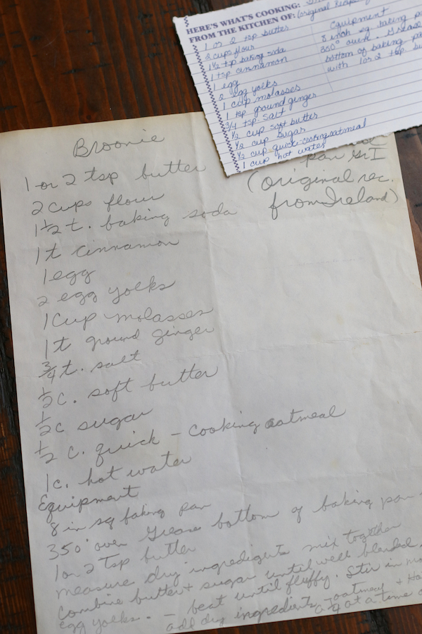 Hand Written Broonie Recipes laying on a wooden table.