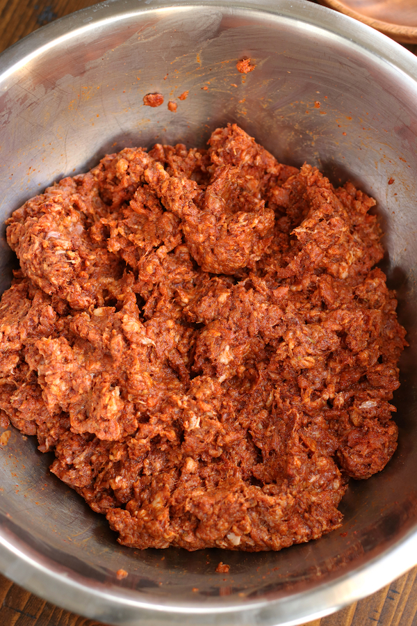 Mexican Chorizo Sausage in the raw form sitting in a stainless steel bowl.