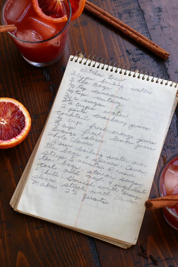 Handwritten Witches Brew Punch written on a spiral notebook.