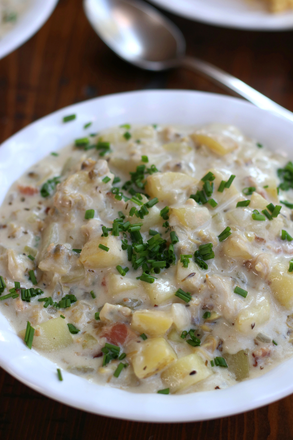 A serving of Easy Clam Chowder garnished with chives.